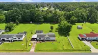 989 Simpson Ditch Road, Elizabeth City, NC 27909 — 3-bedroom manufactured home in Pine Meadows, Elizabeth City, NC, photo 2 of 36: Aerial