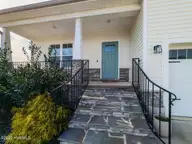 38 Muscadine Way, Smithfield, NC 27577 — 3-bedroom home in Heritage Ridge, Smithfield, NC, photo 3 of 30: 004-1280x960-front-porch