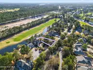 8815 10 Carenden Court, Sunset Beach, NC 28468 — waterfront lot in Thistle Downs, Sunset Beach, NC, photo 7 of 22: DJI_0036 copy