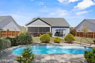 375 Canter Crest Road, Hampstead, NC 28443 — 4-bedroom home in Canter Crest, Hampstead, NC, photo 2 of 65: 60_back exterior