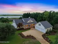 99 Sound View Drive N, Hampstead, NC 28443 — 4-bedroom waterfront home in Belvedere Plantation, Hampstead, NC, photo 1 of 73