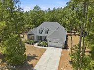 102 Richmond Road, Jackson Springs, NC 27281 — 4-bedroom home in Foxfire Village, Jackson Springs, NC, photo 1 of 47: 3-web-or-mls-DJI_20260615133955_0100_D