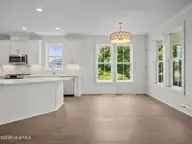 609 Cannonsgate Drive, Newport, NC 28570 — 4-bedroom waterfront home in Cannonsgate, Newport, NC, photo 7 of 41: Eat-In Dining