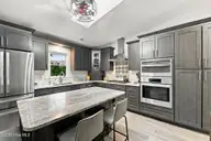 108 Portside Lane, New Bern, NC 28562 — 3-bedroom waterfront home in River Bend, New Bern, NC, photo 14 of 32: center island