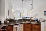 1435 Salter Path Road E1, Indian Beach, NC 28512 — 2-bedroom waterfront condo in Grande Villas at the Preserve, Indian Beach, NC, photo 14 of 65: GVE1 kitchen 3