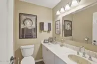 105 Laurel Court, Pine Knoll Shores, NC 28512 — 3-bedroom home in Piksco, Pine Knoll Shores, NC, photo 15 of 64: Downstairs 1/2 bath
