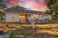 104 NE 34th Street, Oak Island, NC 28465 — 3-bedroom home, Oak Island, NC, photo 2 of 56: 02-KahunaPhoto