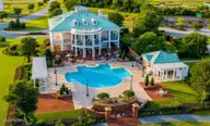 123 Hollings Court, Newport, NC 28570 — waterfront lot in Cannonsgate, Newport, NC, photo 15 of 17: Screenshot of pool & clubhouse from cann