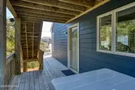 1707 S Shore Drive, Surf City, NC 28445 — 3-bedroom waterfront home in White Hills Beach, Surf City, NC, photo 9 of 65: deck-02c