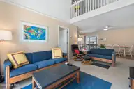 411 5th Street, Sunset Beach, NC 28468 — 4-bedroom home, Sunset Beach, NC, photo 15 of 50: Living Area with Porch Access
