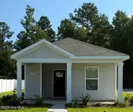 224 Ashworth Drive, Tabor City, NC 28463 — 2-bedroom home in Cottonwood, Tabor City, NC, photo 1 of 14: Lot 42 - 224 Ashworth Drive