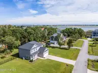 235 Topsail Watch Drive, Hampstead, NC 28443 — 3-bedroom waterfront home in Topsail Watch, Hampstead, NC, photo 1 of 58: 1-web-or-mls-DJI_20260925150430_0066_D