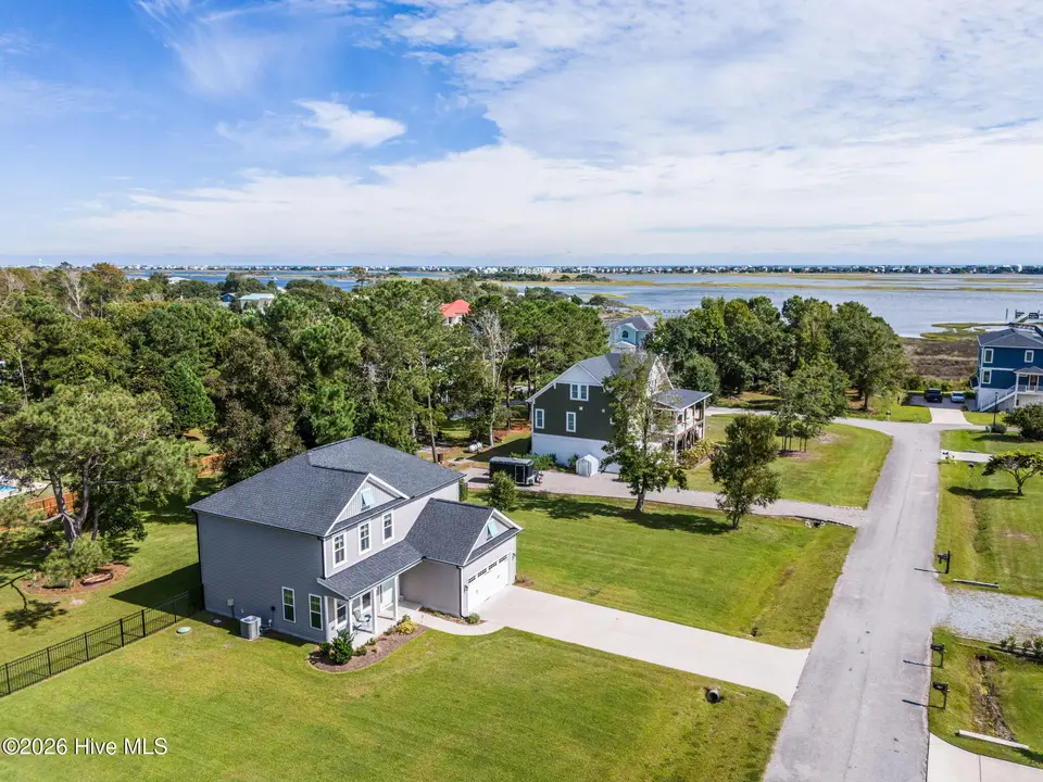 235 Topsail Watch Drive, Hampstead, NC 28443 — 3-bedroom waterfront home in Topsail Watch, Hampstead, NC, photo 1 of 58: 1-web-or-mls-DJI_20260925150430_0066_D
