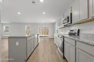 7151 Woodline Drive SW, Sunset Beach, NC 28468 — 3-bedroom home in Seaside Palms, Sunset Beach, NC, photo 15 of 32: Vantage 7091 Woodline Dr SW Lot 26 - 20