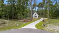 139 Indian Trail, Beaufort, NC 28516 — 3-bedroom home in Indian Trace, Beaufort, NC, photo 4 of 57: 8-web-or-mls-DJI_20250716162232_0886_D