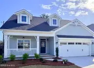 105 Flat Clam Drive, Wilmington, NC 28401 — 3-bedroom home in Riverside Cove, Wilmington, NC, photo 1 of 26: Front of Home