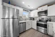 3802 Island Drive, North Topsail Beach, NC 28460 — 3-bedroom waterfront townhome in MFBostic, North Topsail Beach, NC, photo 19 of 49: Kitchen