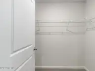 5791 Harebell Road Unit 150, Leland, NC 28451 — 4-bedroom townhome in SeaBrooke, Leland, NC, photo 23 of 51: 23 primary closet
