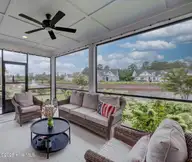 5119 Creswell Drive, Leland, NC 28451 — 3-bedroom waterfront home in Brunswick Forest, Leland, NC, photo 8 of 74: Screened Porch
