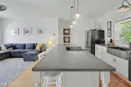 168 NW 6th Street, Oak Island, NC 28465 — 2-bedroom home in Tranquil Harbor, Oak Island, NC, photo 9 of 34: HewittProductions25