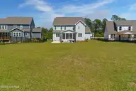 552 Watauga Lane, Aberdeen, NC 28315 — 5-bedroom home in Legacy Lakes, Aberdeen, NC, photo 7 of 58: 552 watauga Exterior-5