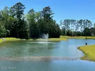 1518 W White Egret Lane NE Lot 741, Bolivia, NC 28422 — 4-bedroom home in Eagle Creek, Bolivia, NC, photo 24 of 43: EC Pond-Fountain