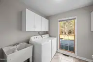 400 Carolina Pines Boulevard, New Bern, NC 28560 — 3-bedroom home in Carolina Pines, New Bern, NC, photo 14 of 41: Laundry Room With Sink