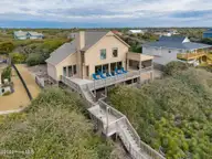 111 Dogwood Circle, Pine Knoll Shores, NC 28512 — 4-bedroom waterfront home in Pine Knoll Association, Pine Knoll Shores, NC, photo 2 of 52: Stunning ocean views from patio