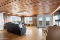 4025 E Beach Drive, Oak Island, NC 28465 — 3-bedroom waterfront home in Long Beach, Oak Island, NC, photo 20 of 40: 36-web-or-mls-CAMMediaLLC.com (36 of 47)