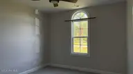 515 Davidson Drive, Newport, NC 28570 — 4-bedroom home in Gracelyn Park, Newport, NC, photo 23 of 36: 515 Davidson Bedroom 2 on front of house