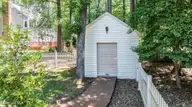 1215 Cambridge Road NW, Wilson, NC 27896 — 4-bedroom home in Woodridge, Wilson, NC, photo 13 of 53: 1215-Shed1
