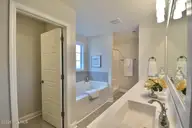 228 S Bandwheel Way, Hampstead, NC 28443 — 4-bedroom home in Sawyers Run, Hampstead, NC, photo 16 of 31: Primary Suite Bath