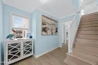 1004 N Shore Drive, Surf City, NC 28445 — 4-bedroom waterfront home, Surf City, NC, photo 5 of 40: 10_stairs