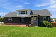 201 Mansfield Parkway, Morehead City, NC 28557 — 4-bedroom waterfront home in Morehead Bluffs, Morehead City, NC, photo 1 of 50: Front
