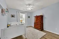 7115 Brittany Lakes Drive, Wilmington, NC 28411 — 4-bedroom waterfront home in Brittany Lakes, Wilmington, NC, photo 18 of 37