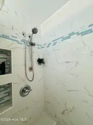 820 Cedar Point Circle, Elizabeth City, NC 27909 — 3-bedroom home in Briarwood, Elizabeth City, NC, photo 13 of 29: En-Suite Tiled Shower