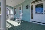 40 Sailview Drive, North Topsail Beach, NC 28460 — 3-bedroom waterfront home in Cape Island, North Topsail Beach, NC, photo 6 of 61: Rocking Chair Front Porch