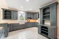 86 Plantation Passage Drive SE, Bolivia, NC 28422 — 4-bedroom waterfront home in Winding River Plantation, Bolivia, NC, photo 12 of 77: Kitchen