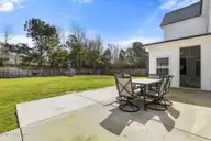 166 Camden Trail, Hampstead, NC 28443 — 4-bedroom waterfront home in Camden, Hampstead, NC, photo 15 of 41: Expansive Backyard with Patio!