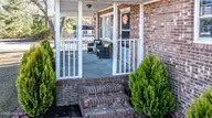 100 Wanda Drive, Pikeville, NC 27863 — 3-bedroom home in Sparrow Point, Pikeville, NC, photo 14 of 34: 100-Porch