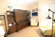 423 W Main Street 301, Washington, NC 27889 — 2-bedroom waterfront condo in Buoy Tender Station, Washington, NC, photo 20 of 39: office with murphy bed
