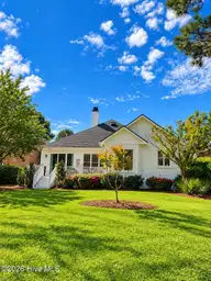 606 Wild Dunes Circle, Wilmington, NC 28411 — 3-bedroom waterfront home in Porters Neck Plantation, Wilmington, NC, photo 2 of 15: backofhouse