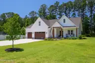 210 Brittany Lane, Stella, NC 28582 — 3-bedroom waterfront home in Forest Ridge, Stella, NC, photo 4 of 70: 210 Brittany - Updated Exterior - MLS_18