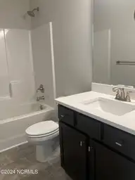 1306 Caracara Drive Model Home, New Bern, NC 28560 — 4-bedroom waterfront home in Fairfield Harbour, New Bern, NC, photo 19 of 24: Guest Bath