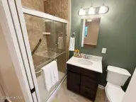 34 Holland Drive, Castle Hayne, NC 28429 — 3-bedroom home in Wrightsboro Acres, Castle Hayne, NC, photo 11 of 22: Bathroom 1