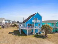 154 Sand Dollar Street, Holden Beach, NC 28462 — 3-bedroom waterfront home in Heritage Harbor, Holden Beach, NC, photo 1 of 65