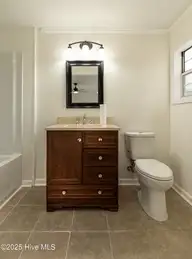 142 Pine Valley Lane, West End, NC 27376 — 2-bedroom waterfront manufactured home in Pine Vly Sub, West End, NC, photo 18 of 24: 251217-142PineValleybath-8491-HDR