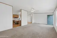 124 Zack Circle, Elizabeth City, NC 27909 — 3-bedroom manufactured home in Red Oak, Elizabeth City, NC, photo 5 of 36: Living Room