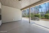 2050 Lindrick Court NW, Calabash, NC 28467 — 3-bedroom home in Spring Mill, Calabash, NC, photo 23 of 32: 40-web-or-mls-29 back porch