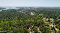 114 Killdeer Drive, Hampstead, NC 28443 — 4-bedroom waterfront home in Pelican Reef, Hampstead, NC, photo 10 of 57: dji_fly_20260417_112320_32_1776892740334